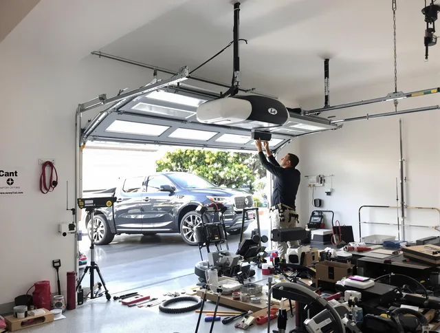 Ridgefield Garage Door Repair specialist installing smart garage door opener system in Ridgefield home