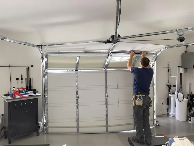 Ridgefield Garage Door Repair specialist performing precise section replacement on Ridgefield garage door